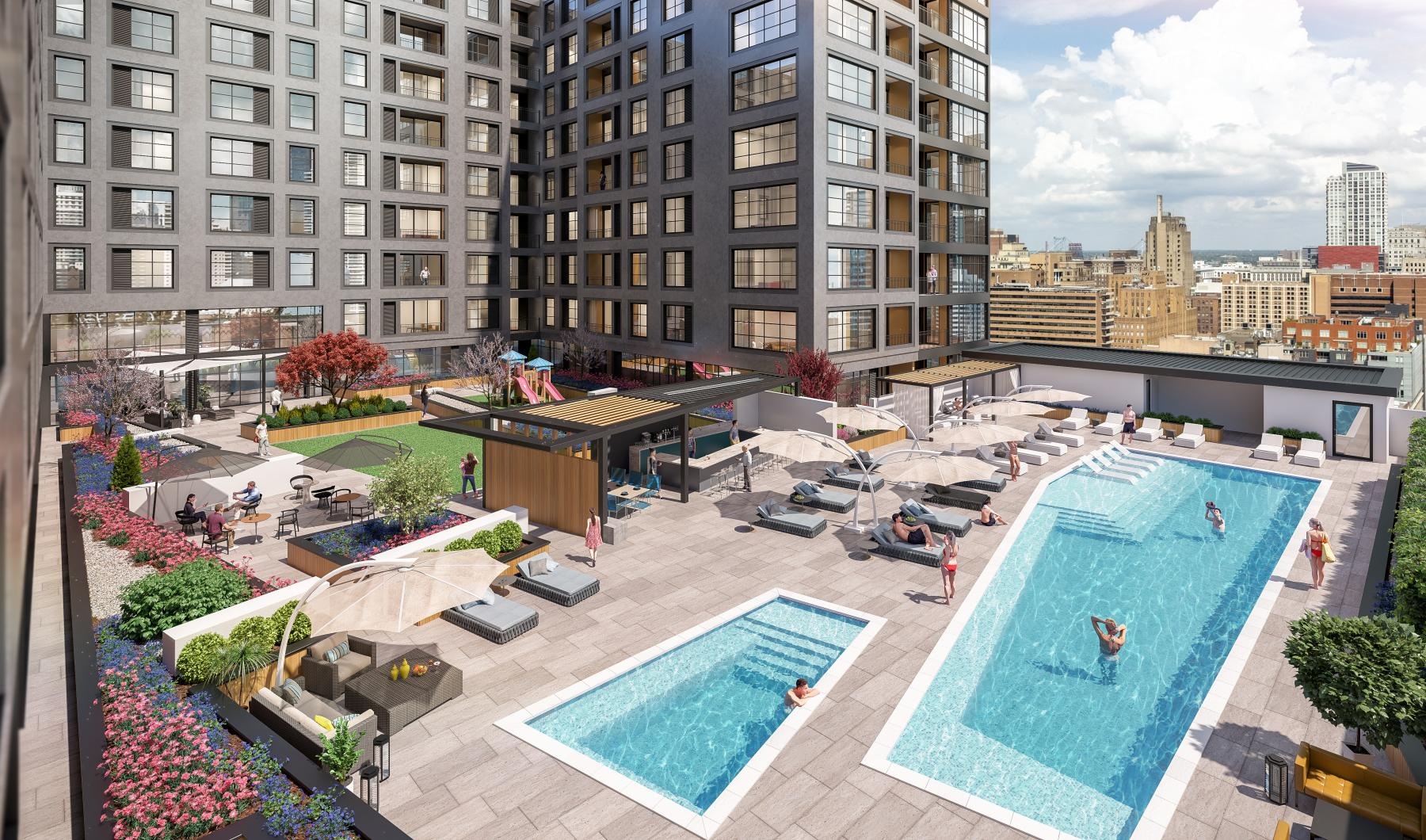 a courtyard with a pool and buildings