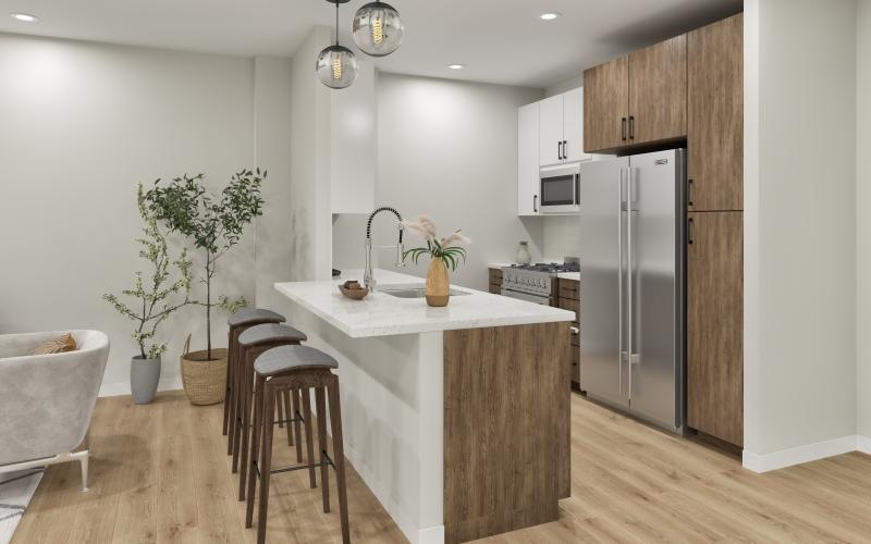 a kitchen with a table and chairs